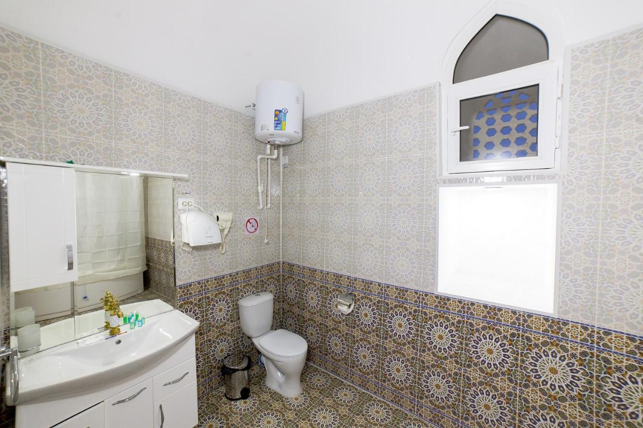 Feruzkhan Hotel - Madrassah Mohammed Rakhim Khan 1871 ヒヴァ エクステリア 写真