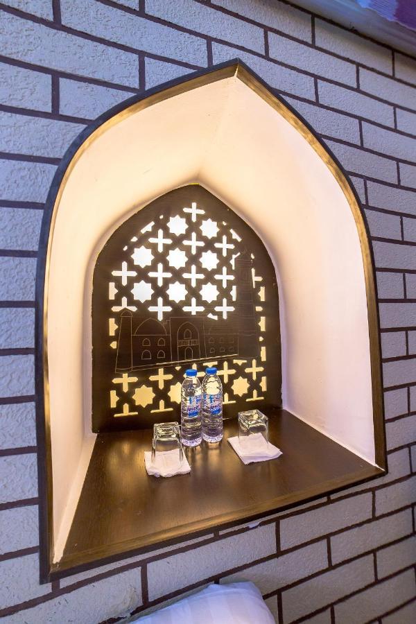 Feruzkhan Hotel - Madrassah Mohammed Rakhim Khan 1871 ヒヴァ エクステリア 写真